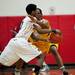 Ypsilanti junior Jalen Harmon defends in the game against Saginaw High on Tuesday, March 19. Daniel Brenner I AnnArbor.com